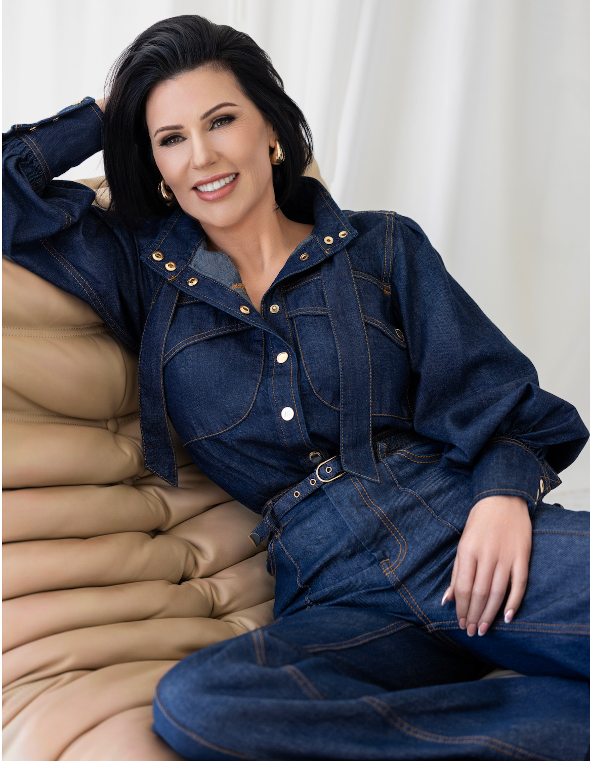 My Perfect Cosmetics founder with the product range on TV